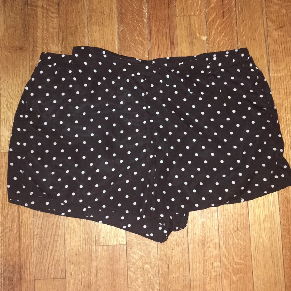 Silky polka dot shorts with front bow detail.